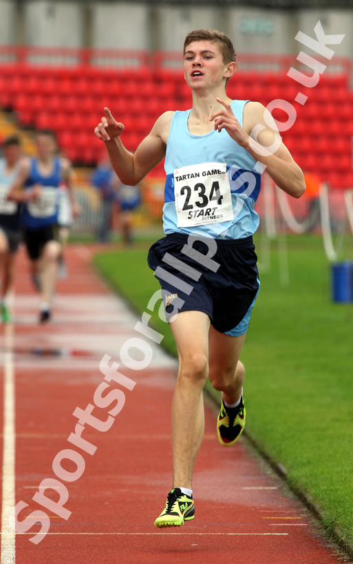 Jason Blackburn (Middlesbrough AC and Mandale) wins the Under-15s 1500 metres, Gateshead Tartan Games